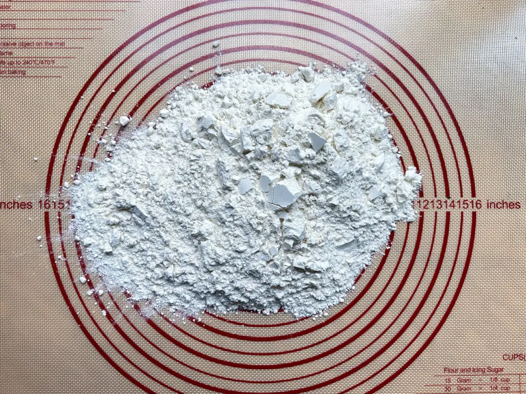 Flour on a large baking mat