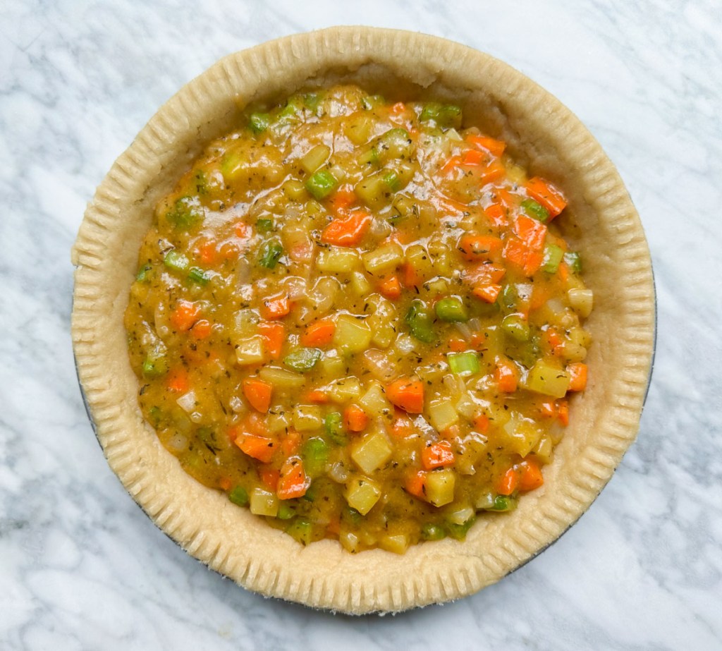 pie crust with veggie pot pie filling and no top crust