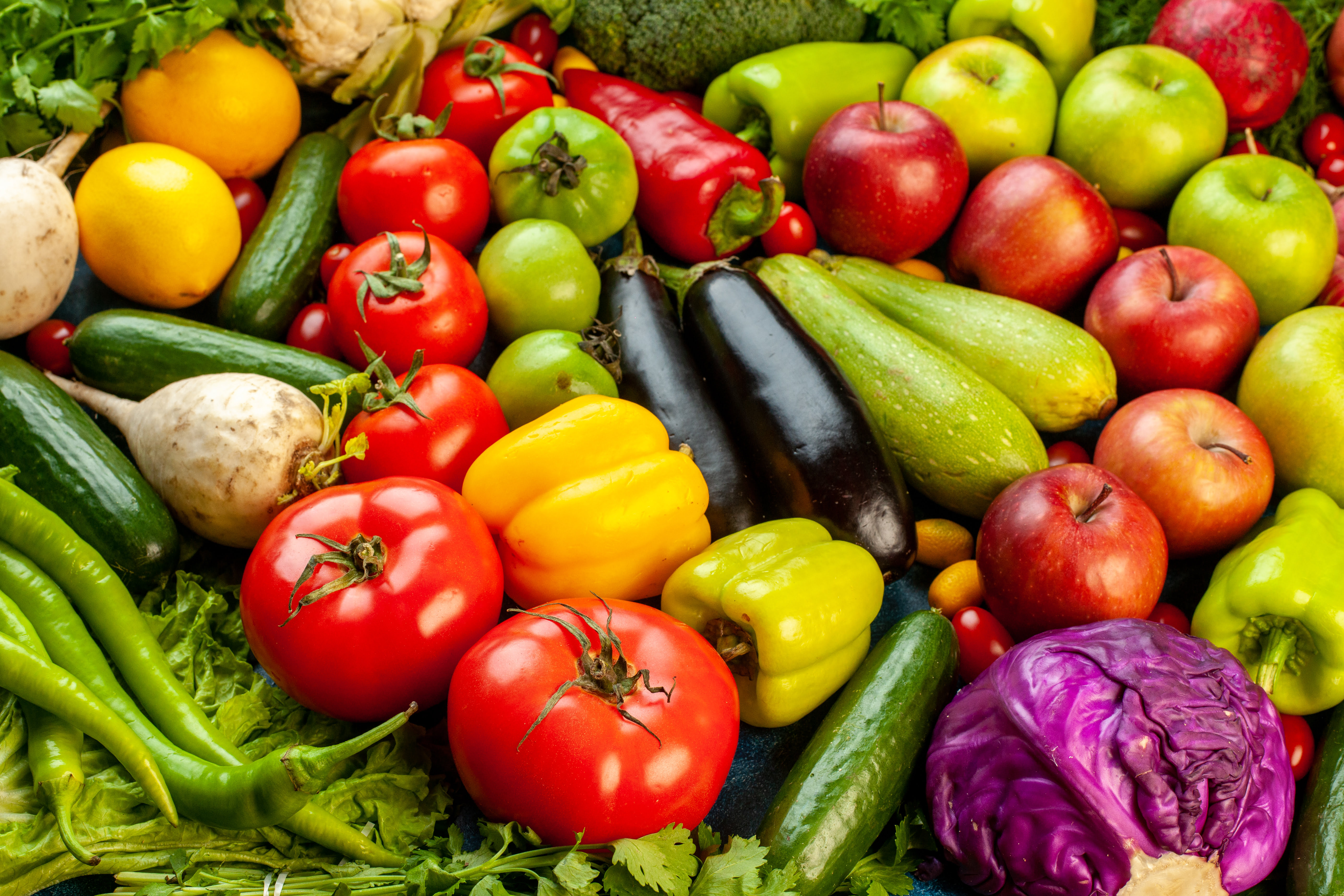 A variety of fruits and vegetables of all colors together