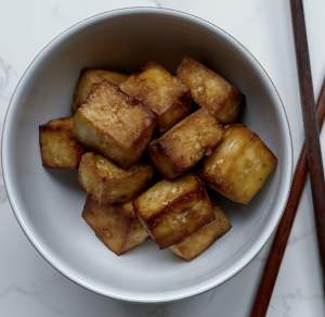 Bowl of finished crispy air fryer sesame tofu
