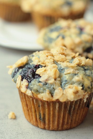 close up vegan blueberry muffins with streusel topping