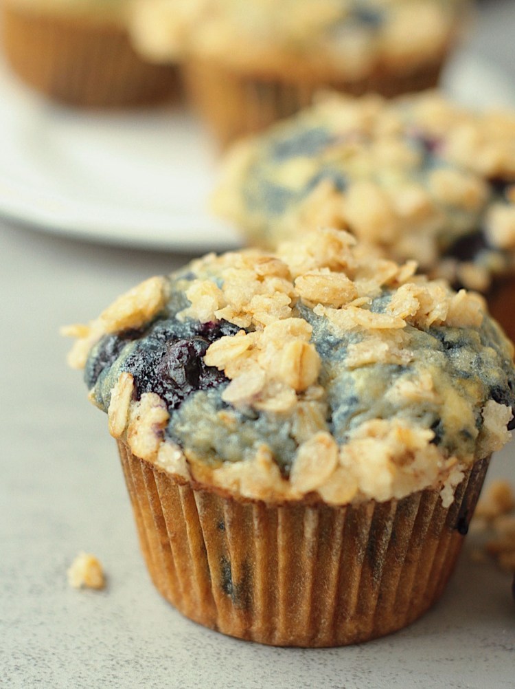 close up vegan blueberry muffins with streusel topping