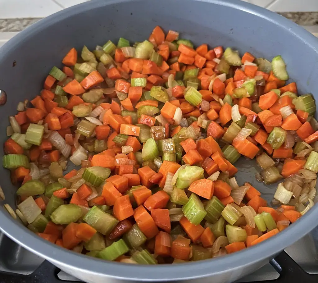 Veggies cooking in saute pan
