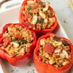 Top view of finished vegan italian stuffed peppers before adding vegan cheese
