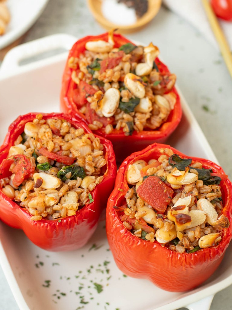 Top view of finished vegan italian stuffed peppers before adding vegan cheese