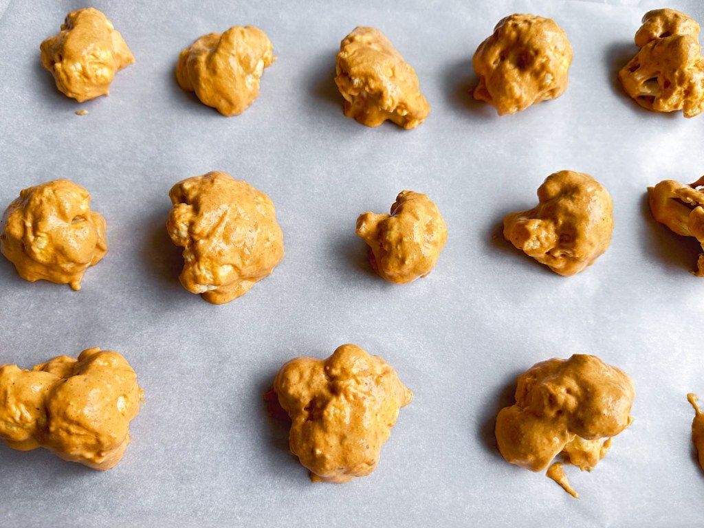 Coated cauliflower florets before first bake
