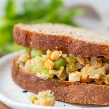 Chickpea salad sandwich between rye bread