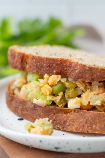Chickpea salad sandwich between rye bread