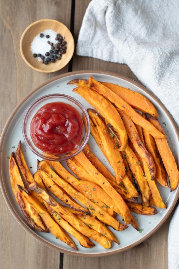top view air fryer sweet potato fries on plate