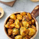 Finished vegan breakfast potatoes in small brown crock