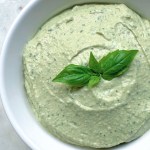 finished bowl of basil lemon hummus