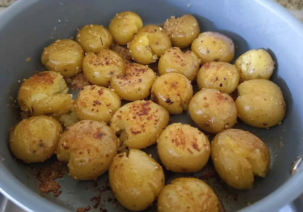 Crispy garlic smashed potatoes once flipped