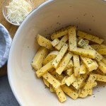 uncooked polenta fries coated in spices