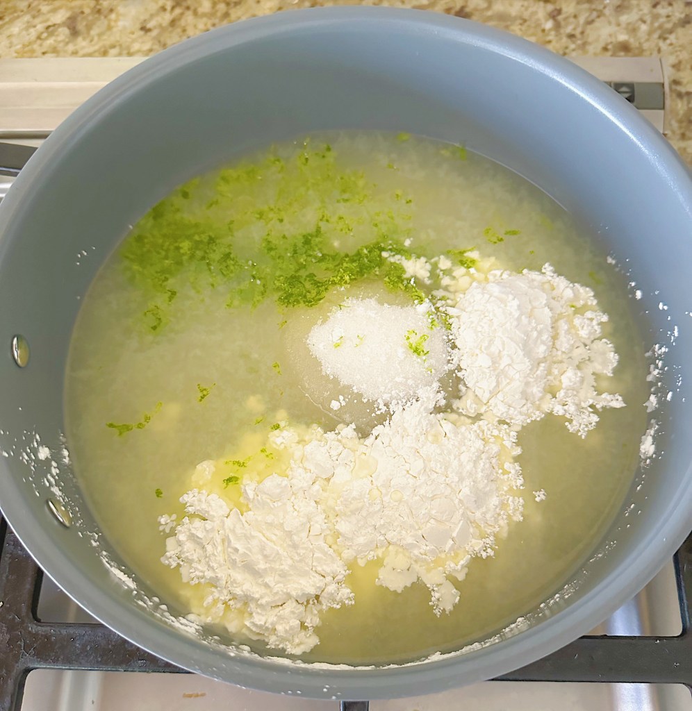 ingredients for vegan key lime tart filling in a cold pan