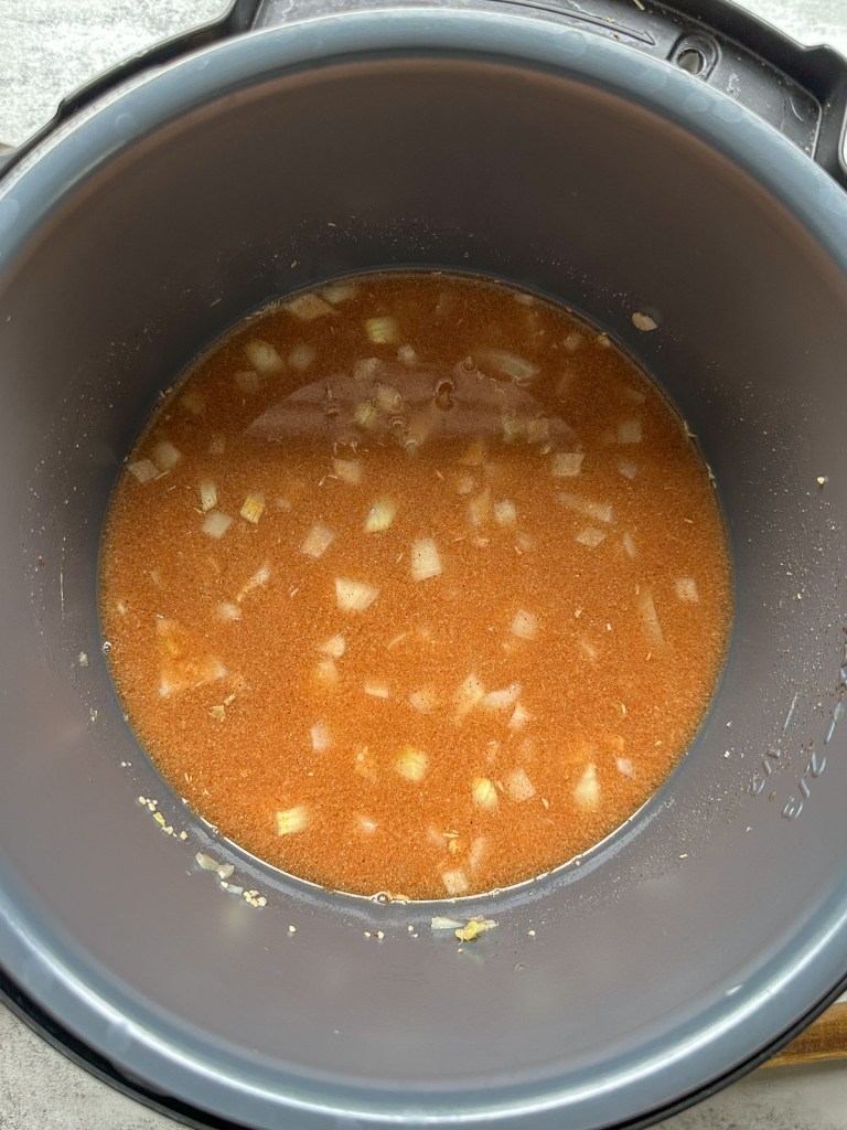 lentil sloppy joe ingredients in instant pot stirred before cooking
