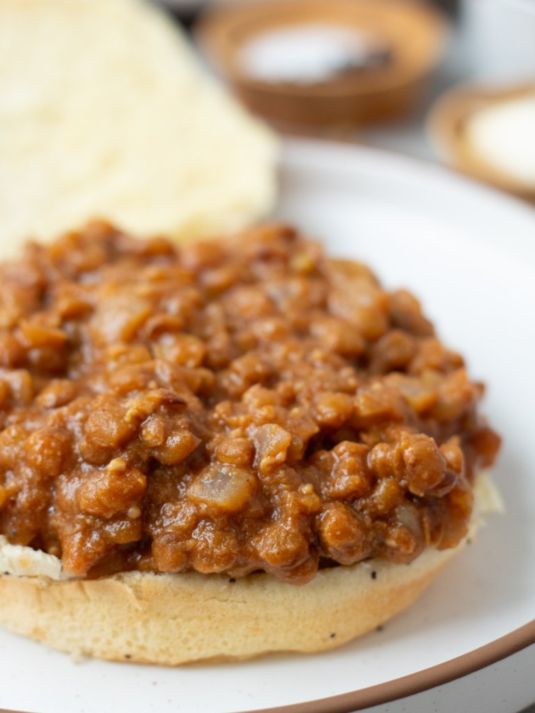 close up finished sloppy joe on open face bun