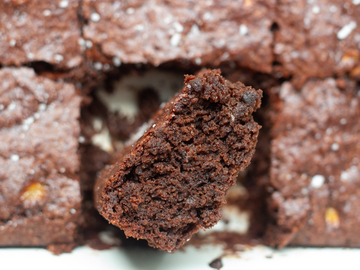 vegan brownies turned in pan showing texture