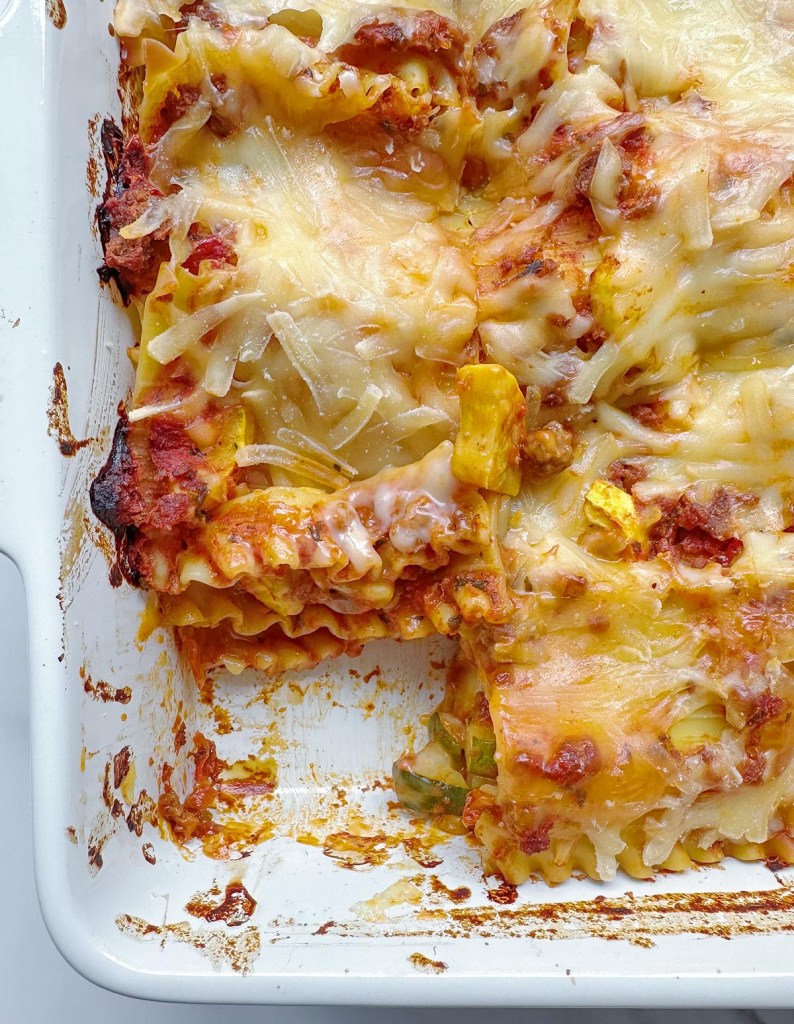 finished vegan lasagna with slice taken out