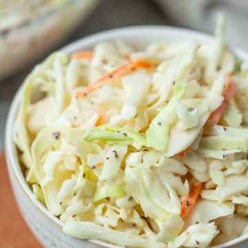 vegan coleslaw in a white bowl