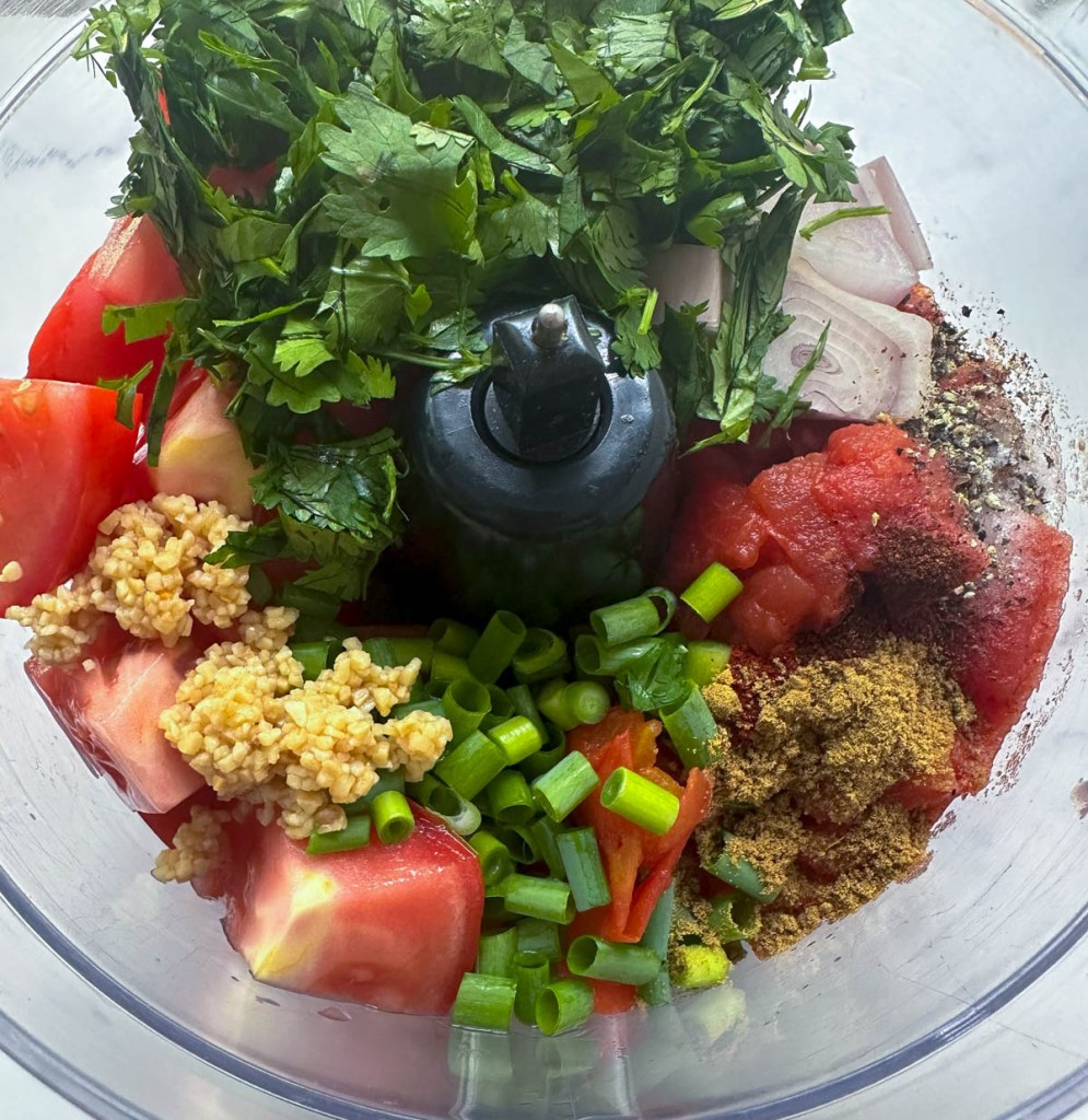 ingredients for easy mango salsa in food processor before pulsing