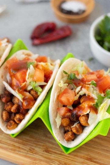 chickpea tacos topped with lettuce and tomato