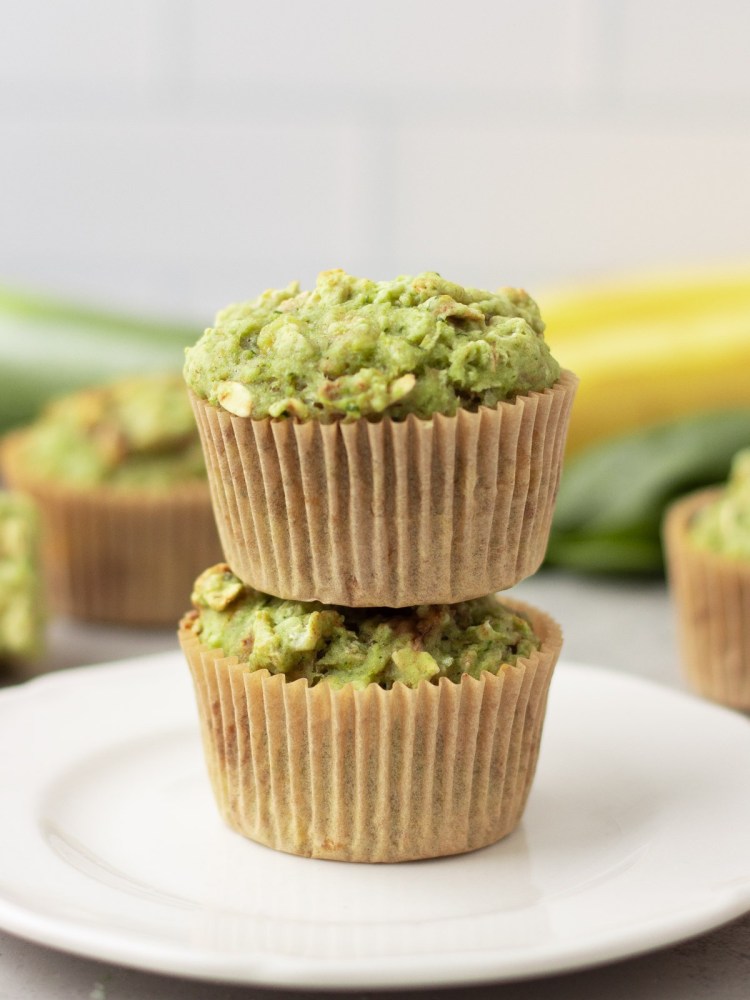 hidden veggie muffins stacked on a plate