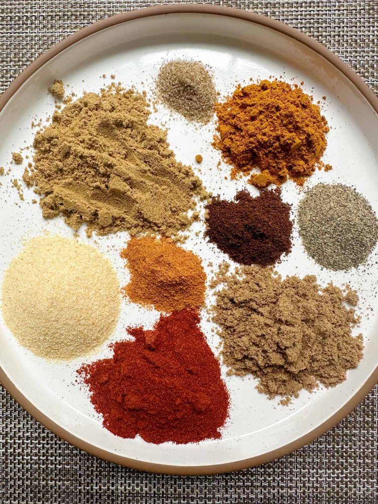 shawarma spice blend with all spices separated on a plate