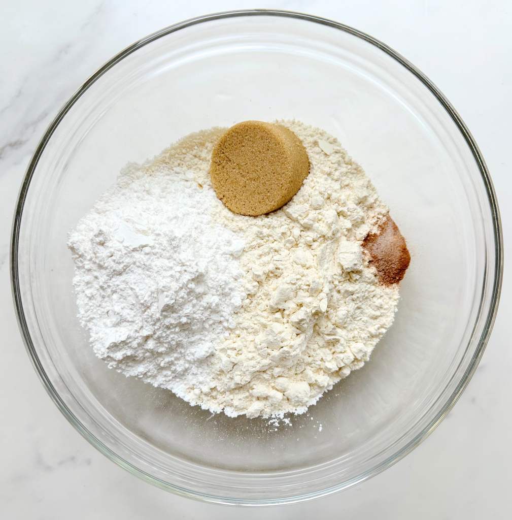 dry ingredients for vegan brown sugar shortbread cookies in a glass bowl