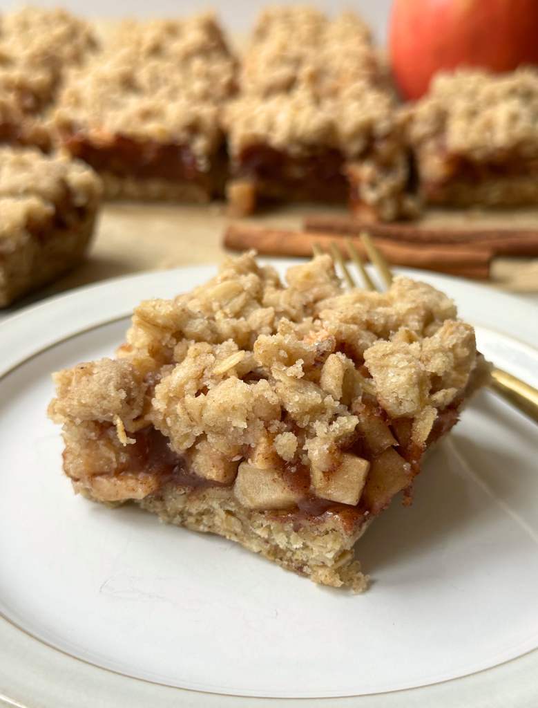 vegan apple pie crumble bar on a plate with form