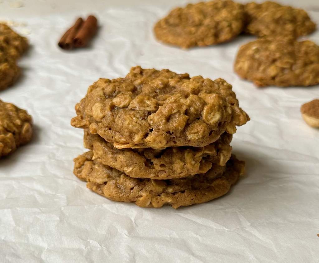 pumpkin spice oatmeal cookies stacked on one another