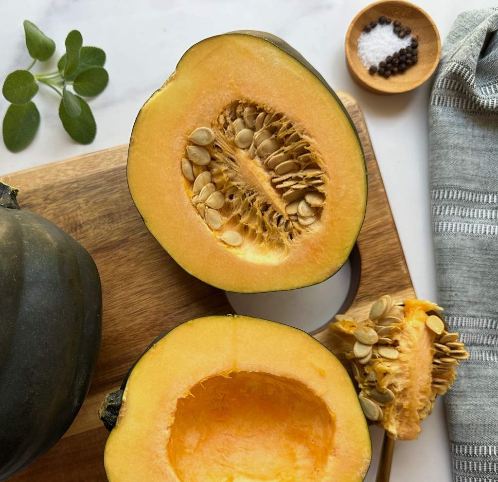 acorn squash cut open with meat scooped out