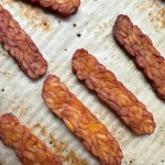 close up of smoky maple tempeh bacon