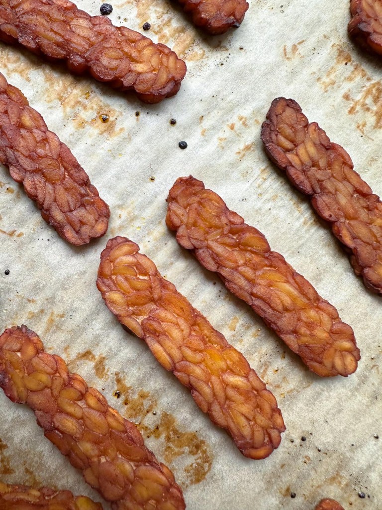 close up of smoky maple tempeh bacon