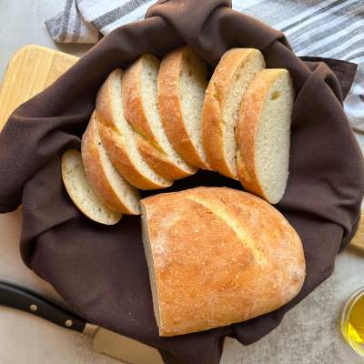 Vegan italian bread sliced in a basket