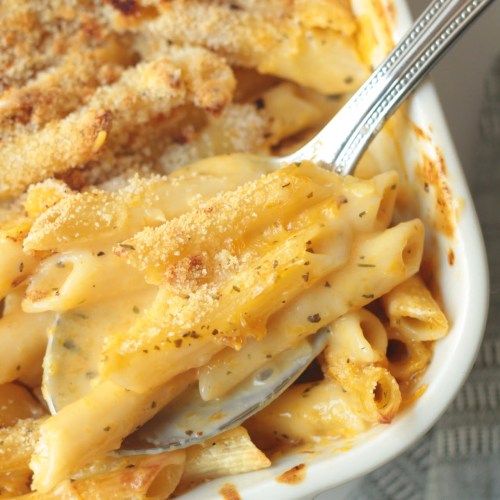 finished vegan butternut squash mac and cheese with scoop taken out