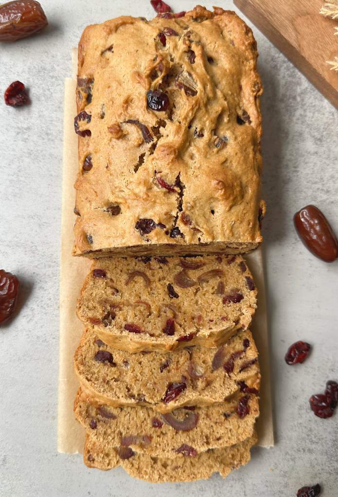 finished loaf of vegan cranberry date bread