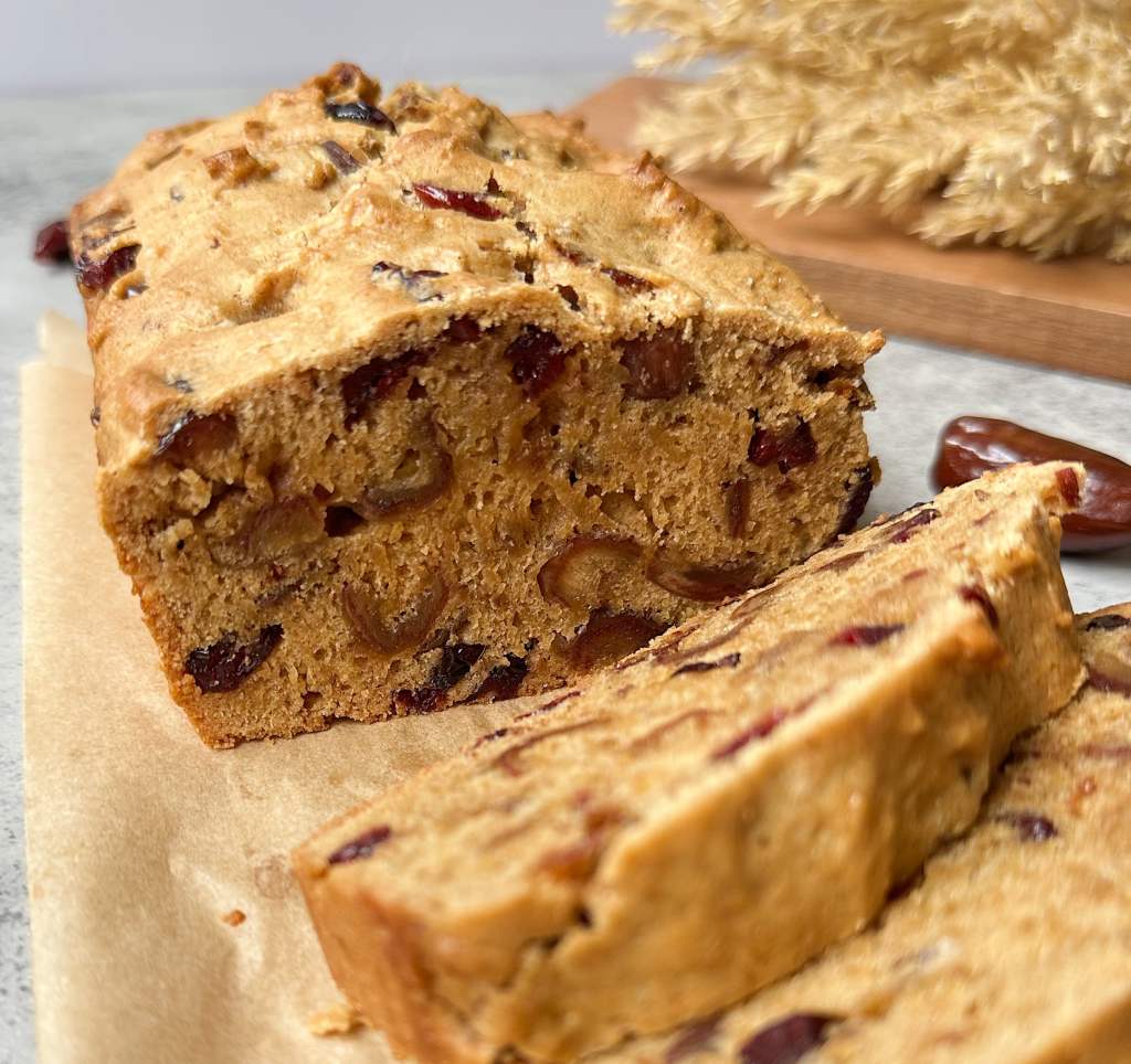 close up view of vegan cranberry date bread sliced