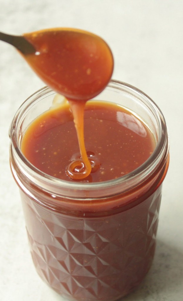 Finished vegan caramel sauce in a glass container