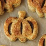 mini vegan pumpkin pies on parchment paper