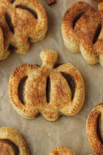 mini vegan pumpkin pies on parchment paper