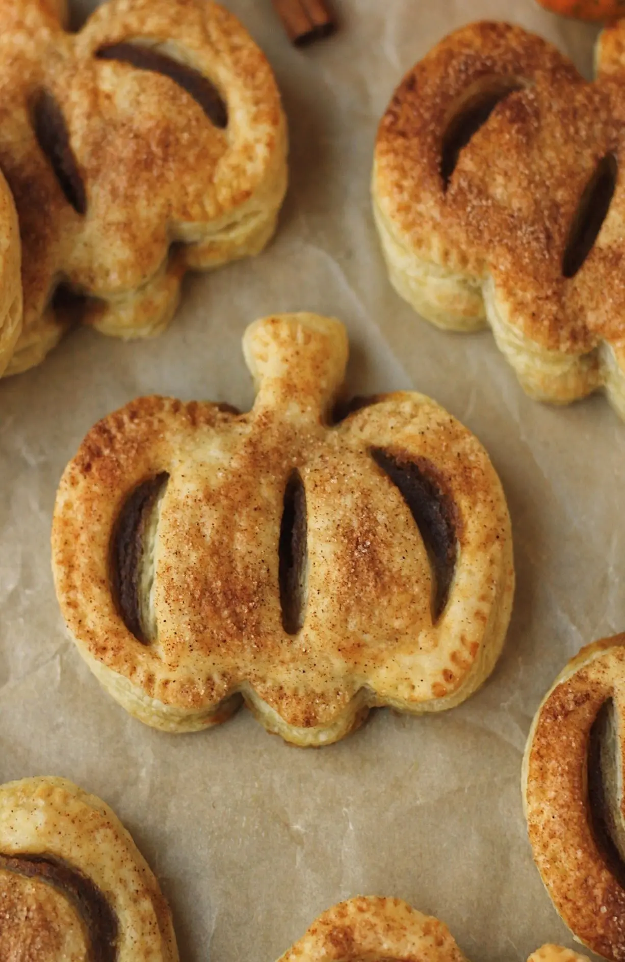 mini vegan pumpkin pies on parchment paper