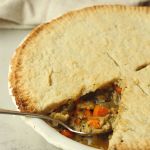 vegan mushroom pot pie with one slice taken out