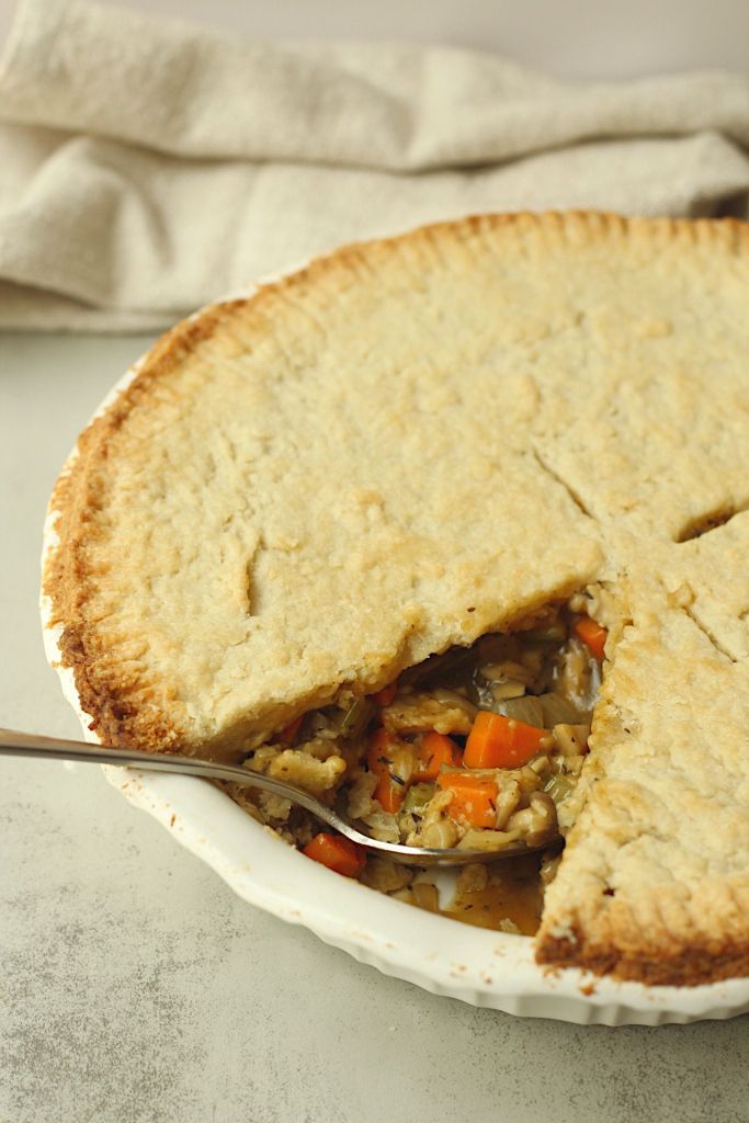 vegan mushroom pot pie with one slice taken out
