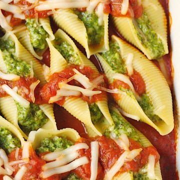 vegan stuffed shells with spinach in the baking dish