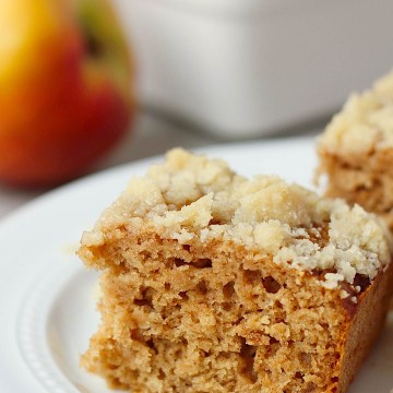 vegan applesauce cake pieces on a white plate
