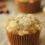 vegan carrot apple muffin on parchment paper