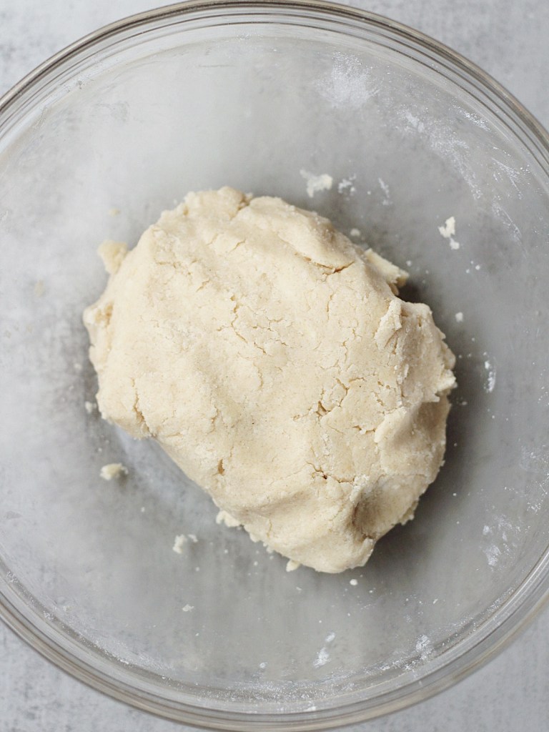gluten-free shortbread crust dough in bowl