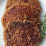 vegan breakfast patties on a plate with fork