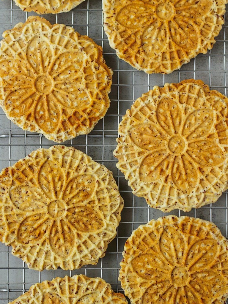 finished vegan lemon pizzelle on cooling rack