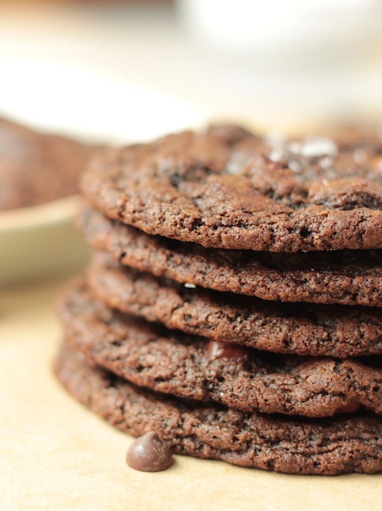 vegan double chocolate chip cookies stacked